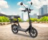Fotografija izdelka QUBO BEST 14" električni skiro, 14" gume, 500W motor, 35km doseg, 48V 10.5Ah 504Wh baterija, vzmetenje, LCD zaslon, LED osvetlitev, ogledala, košara, nosilec, disk zavore, aplikacija, črno oranžen